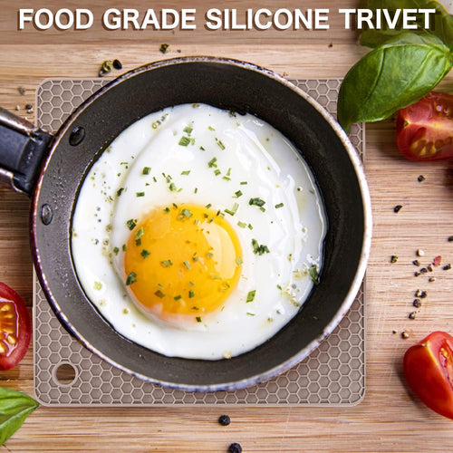 Almond silicone trivet under a pan; cookware not included