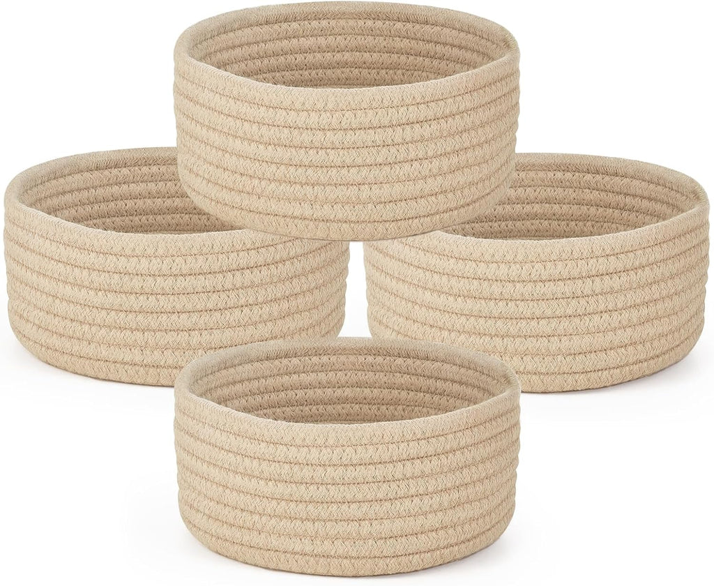 Set of four beige round cotton rope storage baskets
