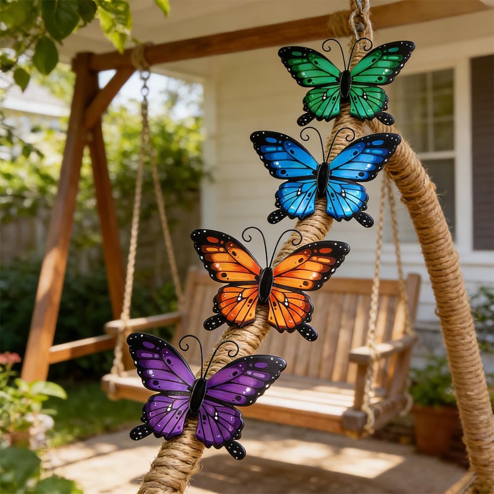 Four metal butterfly decorations styled on a porch; accessories not included