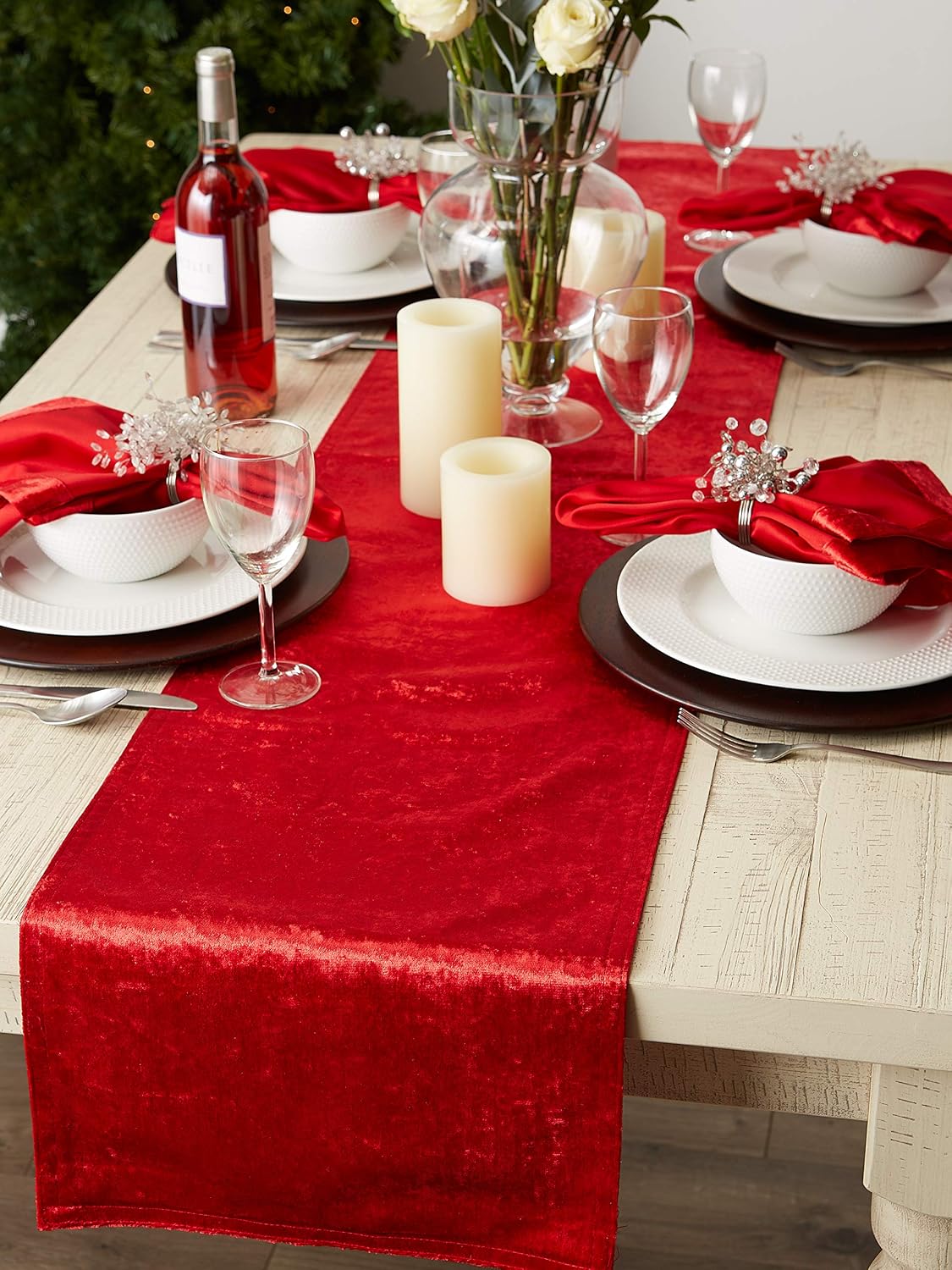 Red velvet table runner styled on a dining table; tableware and decorations not included